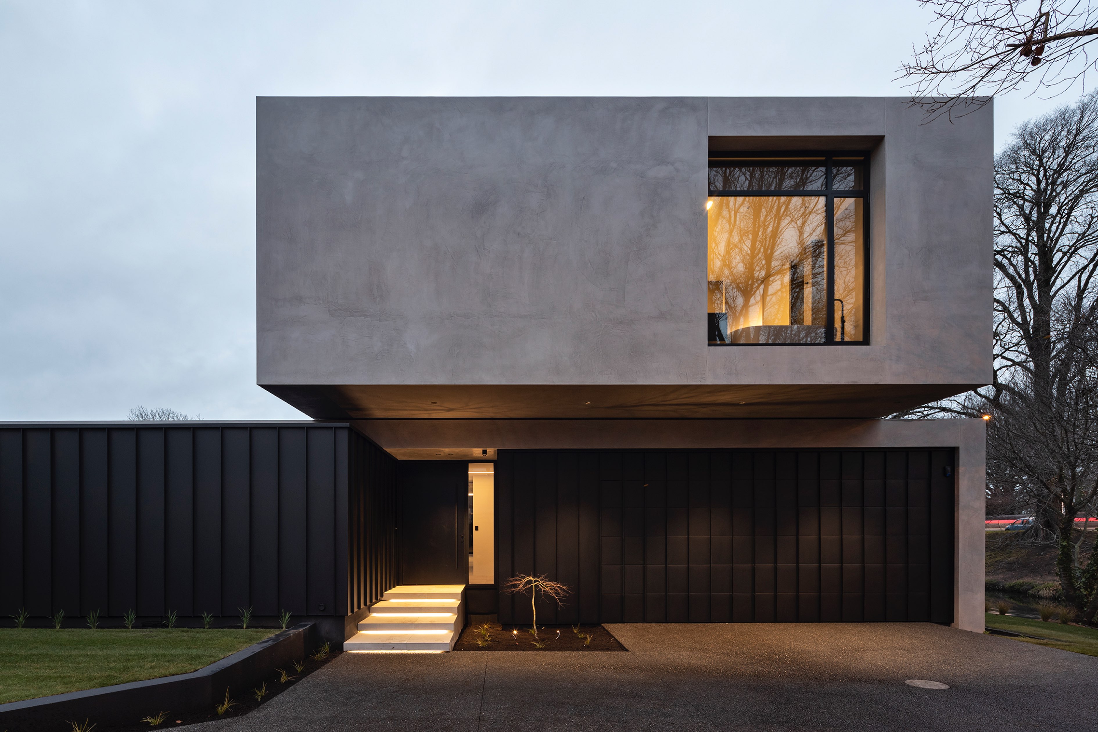 Exterior of contemporary central-Christchurch home with cantilevered first-story